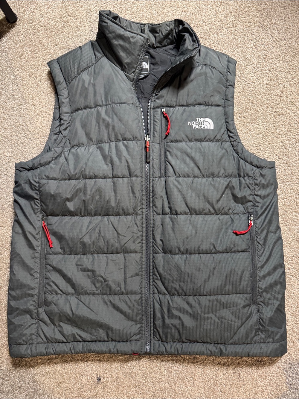 The North Face Men’s Charcoal Quilted Insulated Vest with Red Accents